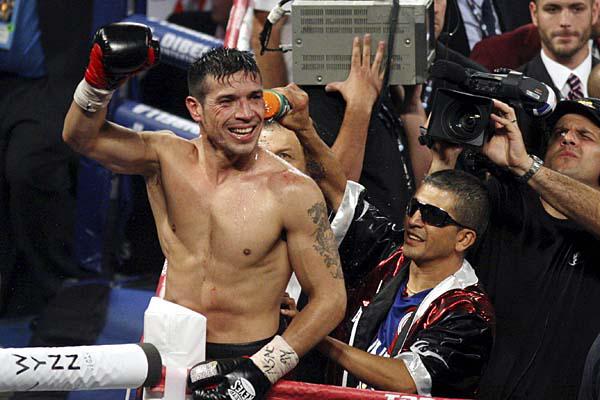 VA POR MÁS Pese a estar lesionado Martínez ya tiene la mente puesta en su primera defensa mundialista