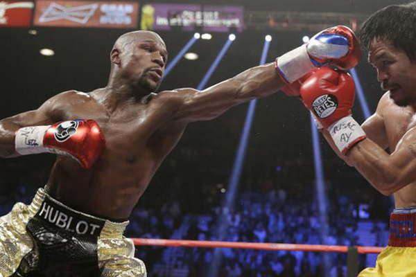 Mayweather derrotoacute a Pacquiao y se convirtioacute en un rey imbatible