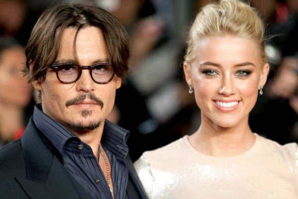 Amber Heard esposa de Johnny Depp iquestestariacutea saliendo con una mujer