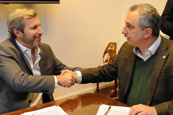 Misiones firmoacute el acuerdo para la devolucioacuten del 15-en-porciento- de la corparticipacioacuten