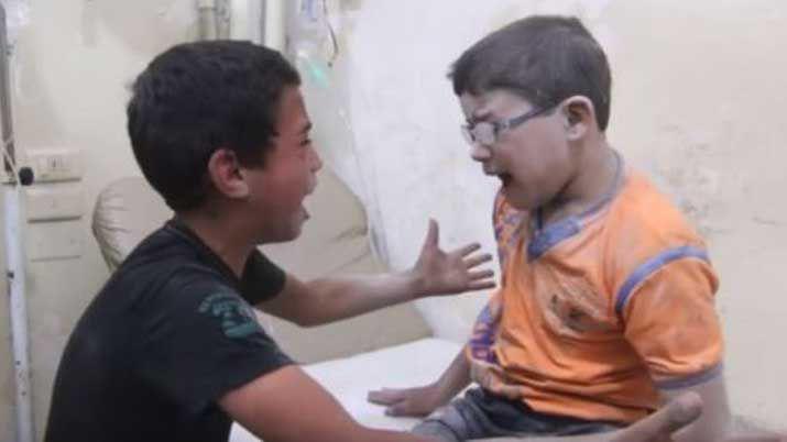 CONMOVEDOR VIDEO- Nenes sirios lloran la muerte de su hermano