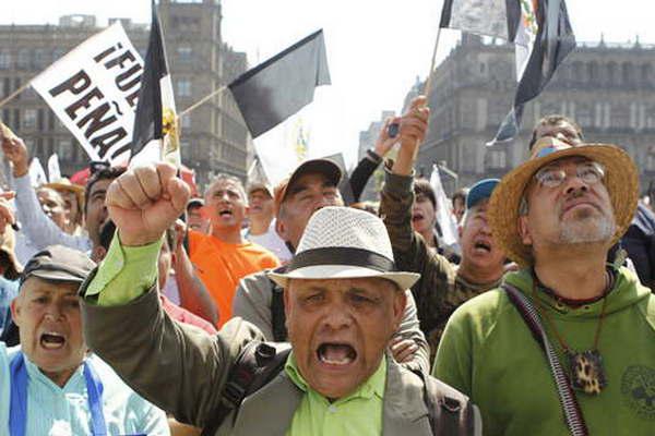 Continuacutean las marchas en Meacutexico en contra del Gasolinazo
