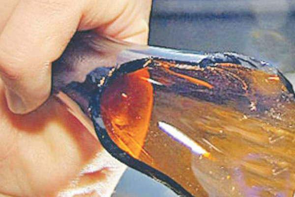 Herido con una botella rota