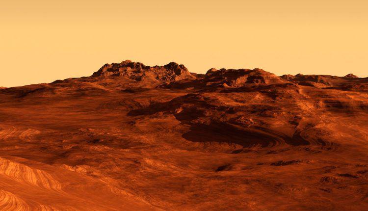 Una foto muestra un craacuteter con hielo en Marte