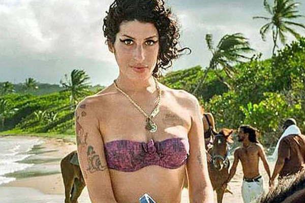 Amy Winehouse sigue dando que hablar- revelan fotos ineacuteditas
