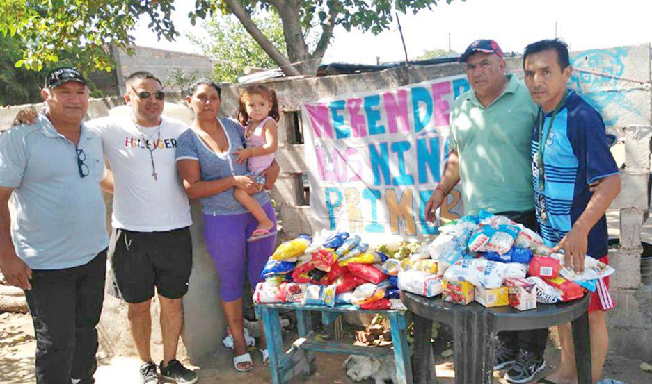 ENCUENTRO Silvia Maldonado responsable del merendero beneficiado recibió la donación del presidente Jorge Martínez
